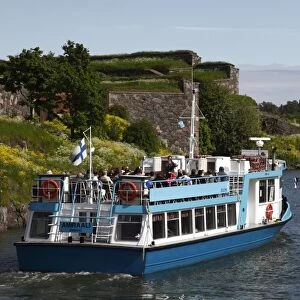 Ferry to Helsinki, with historic Fortress walls in the background, UNESCO World Heritage Site