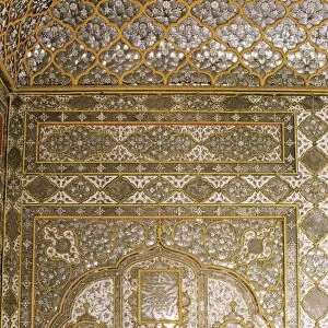 Detail of the fine mirror and plaster work found in the Sheesh Mahal