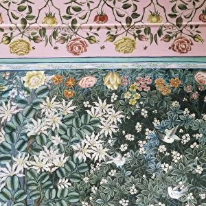 Detail of the finely painted walls in one of the bedroom suites