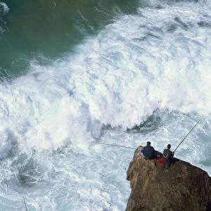 Fishermen on rocks, Tonal Beach, Sagres, Algarve, Portugal, Europe
