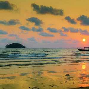 Fishing boat moored off beach south of the city at sunset, Otres Beach, Sihanoukville