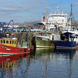 Fishing boats and Car Ferry in the harbour, Mallaig, Highlands, Scotland, United Kingdom, Europe