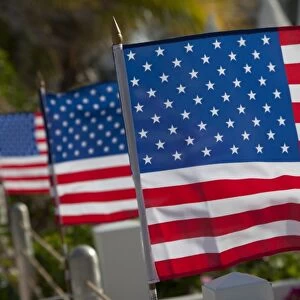 US flags attached to a fence in Key West, Florida, United States of America