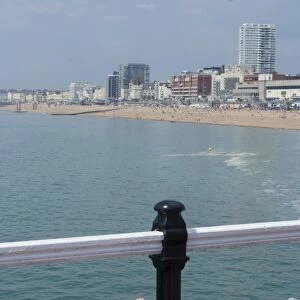 Foot sunbathing on the pier, Brighton, Sussex, England, United Kingdom, Europe