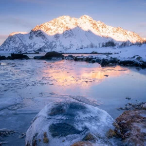 Frozen lake and mountain of the Lofoten Islands, Nordland, Norway, Europe