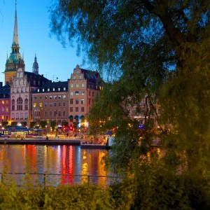 Gamla Stan and Riddarholmen with spire of Riddarholmskyrkan (Riddarholmen Church) at dusk, Stockholm, Sweden, Scandinavia, Europe