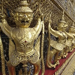 Garudas and nagas on external decorations of the Ubosoth, Wat Phra Kaew temple, Grand Palace, Bangkok, Thailand
