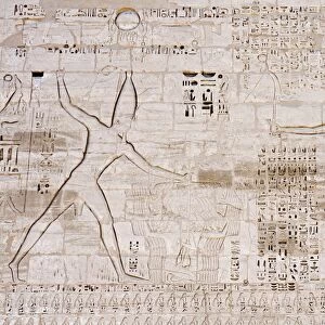 Giant relief of Rameses III smiting enemies before Amen-Ra, South Tower of the first Pylon