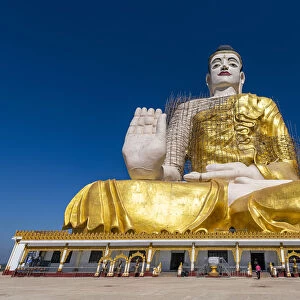 Giant sitting Buddha below the Kyaiktiyo Pagoda (Golden Rock), Mon state, Myanmar (Burma)