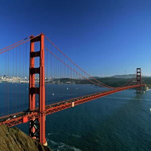 The Golden Gate Bridge with city skyline in background, San Francisco, California