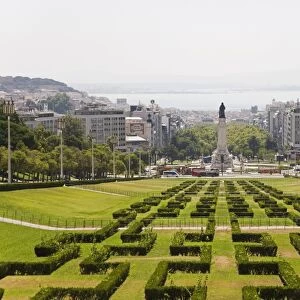 The greenery of the Parque Eduard VII runs towards the Marques de Pombal memorial in central Lisbon