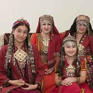 Group picture of Turkmen family in tradtional costume, Turkmenistan, Central Asia, Asia