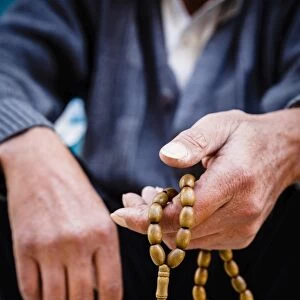 Hands holding worry beads, Bethlehem, West Bank, Palestine territories, Israel, Middle