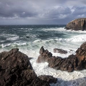 Heavy seas pounding the rocky coastline at Dalbeg, near Carloway, Isle of Lewis, Outer Hebrides, Scotland, United Kingdom, Europe