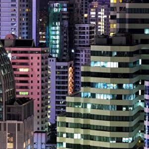 High rise buildings of Bangkok at night from Rembrandt Hotel and Towers, Sukhumvit 18, Bangkok, Thailand, Southeast Asia, Asia