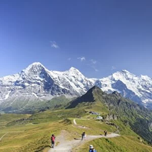 Hikers on the way to Mount Eiger, Mannlichen, Grindelwald, Bernese Oberland, Canton of Bern