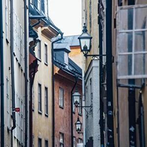 Historic and colorful buildings in Hells Alley, Gamla Stan, Stockholm, Sweden, Scandinavia
