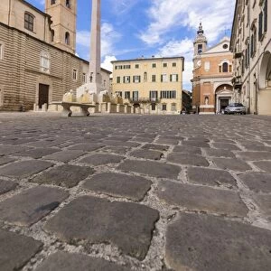 Historical buildings and obelisk of the ancient Piazza Federico II, Jesi, Province of Ancona