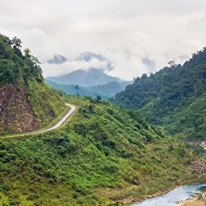 Ho Chi Minh Highway West passing through jungle landscape, Quang Ninh District, Quang Binh Province