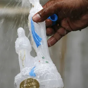 Holy water tap at the Lourdes shrine, Lourdes, Hautes Pyrenees, France, Europe