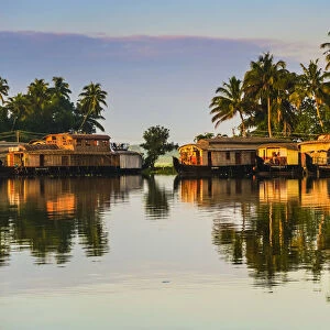 Houseboats moored at dawn after the overnight stay on the popular backwater cruise