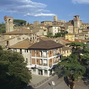 Houses, churches and towers in the town of Passignano