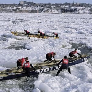 Ice canoe races on the St. Lawrence River during winter carnival, Quebec