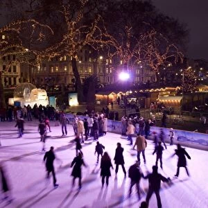 Ice skating outside the Natural History Museum, London, England, United Kingdom, Europe