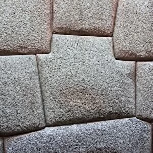 Inca Stone wall made from huge granite blocks fitted skillfully together using no cement