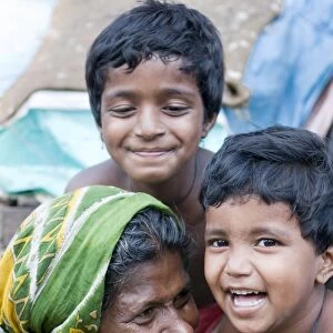 Indian familiy laughing, Kalighat, Kolkata, India, Asia