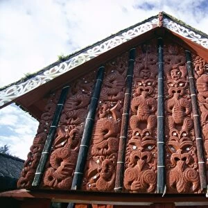 Intricately carved storehouse in replica village at
