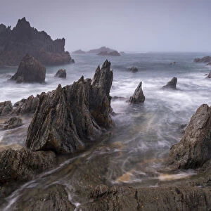 Jagged ledges on the dramatic north Devon coast, Devon, England, United Kingdom, Europe