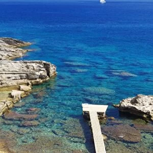 Jetty on the beach and boat, Rhodes, Dodecanese, Greek Islands, Greece, Europe