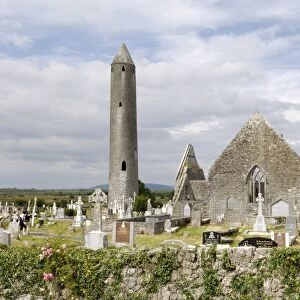 Kilmacdaugh churches and round tower