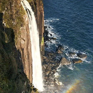 Kilt waterfall falling directly into the sea on the Isle of Skye, Inner Hebrides