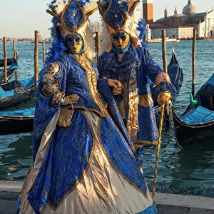 Two ladies in blue and gold masks, Venice Carnival, Venice, UNESCO World Heritage Site