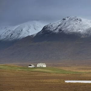 Laekjamdt farm, snow-covered Vididalsfjall mountain behind, near Blonduos