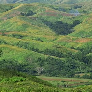 Landscape of green hills and farmland in the Sigatoka River Valley, Fiji, Pacific