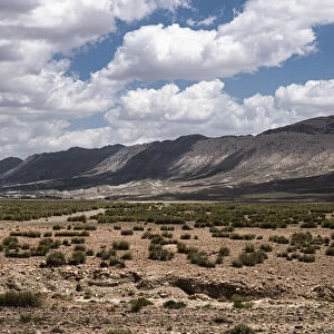 Landscape of Morocco with mountains in the background with white clouds in the sky