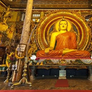 Large Buddhist statue at Gangaramaya Temple, Colombo, Sri Lanka, Asia