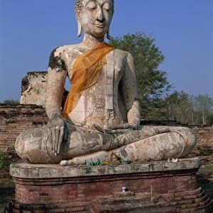 Large statue of the seated Buddha outdoors