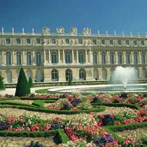 Le Parterre du Midi and fountain in front of the Chateau of Versailles