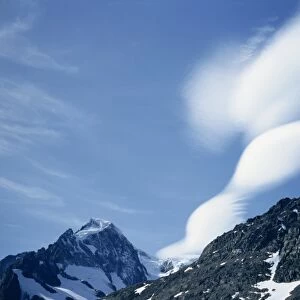 Lenticular clouds over landscape of mountains in South Georgia