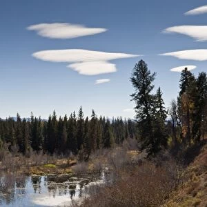 Lenticular clouds over Moose Pond, autumn, Grand Teton National Park, Wyoming, United States of America, North America