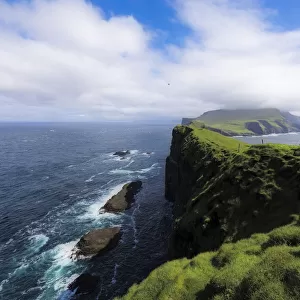 Lighthouse on islet known as Mykines Holmur, Mykines Island, Faroe Islands, Denmark