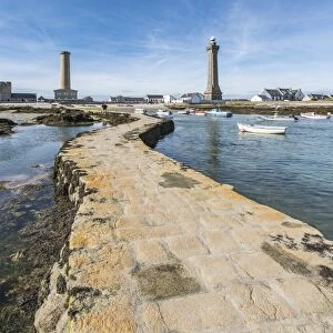 Lighthouses with pier and boats, Penmarch, Finistere, Brittany, France, Europe