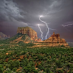 Lightning striking in between Courthouse Butte and Bell Rock near Sedona, Arizona