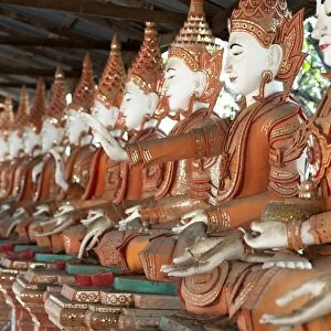 Line of seated Buddhas at the Maha Bodhi Ta Htaung monastery, Monywa township, Sagaing Division