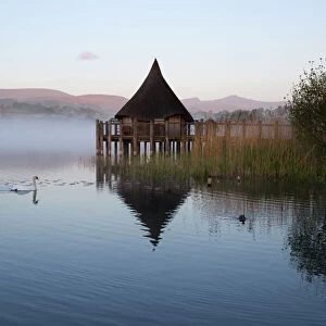 Llangorse Lake and Crannog Island in morning mist, Llangorse, Brecon Beacons National Park