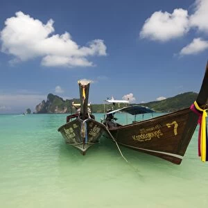 Long-tail boats in Ao Dalam bay, Koh Phi Phi, Krabi Province, Thailand, Southeast Asia, Asia